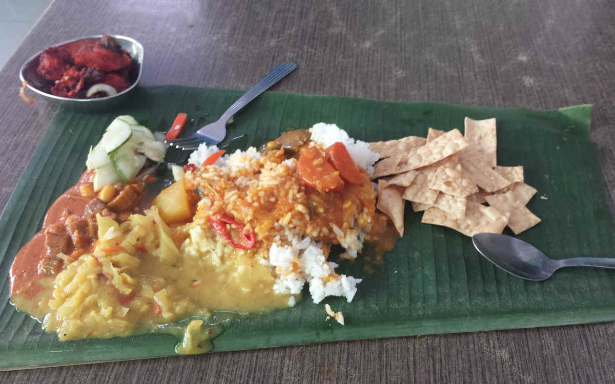 A picture of food on a leaf plate in Malacca Malaysia