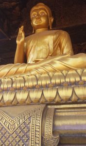 A large golden Buddha at the international buddhist center in Cambodia 